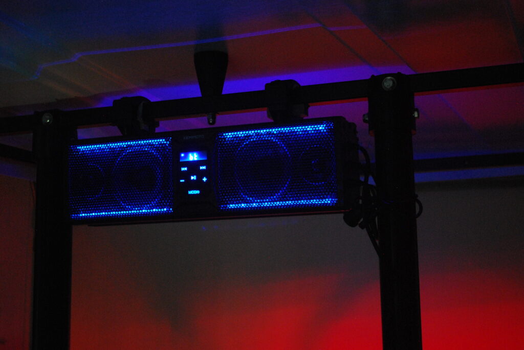 Kemimoto 16" Soundbar with LED lights in low light conditions.